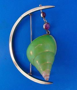 FABULOUS 14k Yellow Gold Cabochon Ruby Bakelite: JK - NGT FABULOUS 14k Yellow Gold Cabochon Ruby Bakelite Crescent Shell Pin Elegant and chic pin that is a great addition to your collection. Weight is 12.1 grams. Made of 14k Yellow Gold,