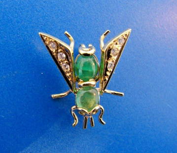 SMALL WORLD 14k Yellow Gold, Diamond & Emerald Bug Pin: DK 14k Yellow Gold, Diamond & Emerald Bug Pin · This is a must for any collector. · The weight is 2.1 grams. The length is ¾ of an inch. The width is 3/8 of an inch. There are 0.06 points of