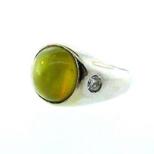 ANTIQUE 18k White Gold, Diamond & Cat's Eye Chrysoberyl: DK 18k White Gold, Diamond & Cat’s Eye Chrysoberyl Ring Vintage · This is a must for a collector. The weight is 8.1 grams. The length is ¾ of an inch. The height is ½ of an inch. There are