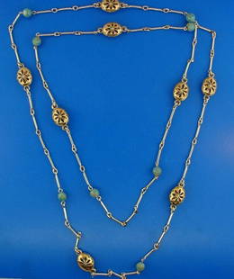 ADORABLE 10k Yellow Gold and Silver Necklace with: JK - N00 ADORABLE 10k Yellow Gold and Silver Necklace with Turquoise Weight is 28.6 grams The necklace made of 10k Yellow Gold, Silver and Turquoise Measurements – Chain: Length - 44” 