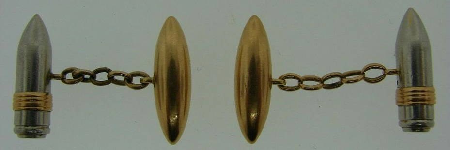 COOL 14k Yellow & White Gold Bullet Cuflinks Circa: DK 14k Yellow & White Gold Bullet Cufflinks Circa 1900s · Wonderful cufflinks that is a necessity in your collection. · The weight is 11.1 grams. · The length of the yellow gold bullet is 7/8