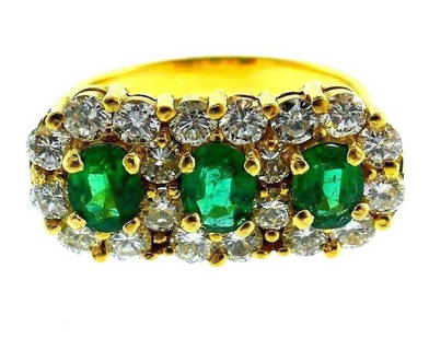 14k Yellow Gold Diamond Emerald Ring: NS JNT0 14k yellow gold diamond emerald ring Measurements: 3/8" H x 3/16" W (the widest part) Ring size is 6 Weight is 5.7 grams In excellent condition; wear consistent with age and use (please