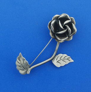 TAXCO SILVER FLOWER PIN BROOCH STAMPED C.1950 VINTAGE: N-GT SILVER TAXCO FLOWER ROSE PIN/BROOCH C.1950 VINTAGE MEASURES 2 1/4'' X 1 3/8'' WEIGHT 7.8 G Click here to see all of our eBay auctions! Reserve: $98.00 Shipping:Domestic: Free shipping to