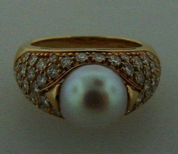 CHIC Bulgari 18k Yellow Gold, Diamond & South Sea Pearl: DK Bulgari 18k Yellow Gold, Diamond & Pearl Ring · Wonderful ring that is a necessity in your collection. · The weight is 8.9 grams. · The height is 3/8 of an inch. The width is ½ of an inch.