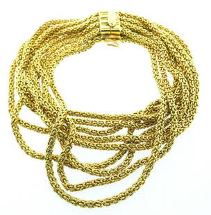 Tiffany & Co. Italy 18k Yellow Gold Multi Strand Woven: AK AA00 Tiffany & Co. Italy 18k Yellow Gold Multi Strand Woven Chain Bracelet · Wonderful bracelet that is a great addition to your collection. · Weight is 78.6 grams · Made of 18k Yellow Gold