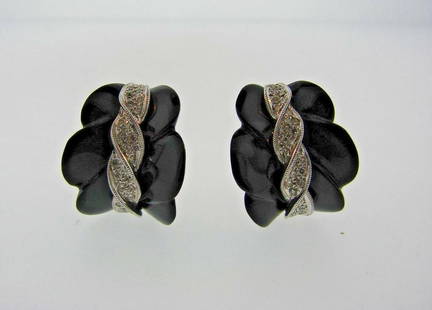 CHIC European 18k White Gold, Diamond & Onyx Earrings: DK European 18k White Gold, Diamond & Onyx Earrings · The weight is 15.7 grams. · The height is ¾ of an inch. The length is ¾ of an inch. The width is ¼ of an inch. There are 0.60 points of