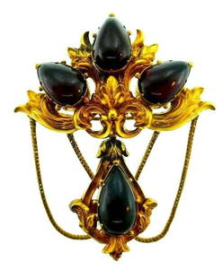 ANTIQUE 9k Yellow Gold & Cabochon Garnet Brooch Circa: Antique 9k Yellow Gold & Cabochon Garnet Brooch Circa 1900s DK · This is a must for a collector. The weight is 17.1 grams. The length is 2 inches. The height is 2 3/8 inches. The width is 1/2 of an