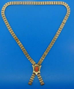 RARE 10k Yellow Gold & Carved Coral Slide Necklace: DK 10k Yellow Gold & Carved Coral Slide Necklace · Wonderful necklace that is a necessity in your collection. · The weight is 26.4 grams. · The length is 22 inches. The length of the slide