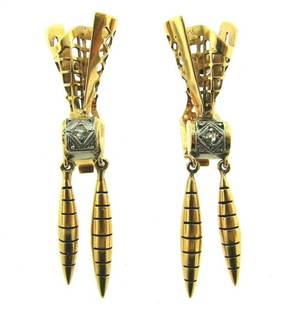 RETRO 18K 750 YELLOW GOLD DIAMOND DANGLE CLIP ON: N-NTO RETRO 18K 750 YELLOW GOLD DIAMOND DANGLE CLIP ON EARRINGS STAMPED Timeless designs, elegant curves and clean fluid lines Capturing the essence of beauty in motion This chic pair of earrings