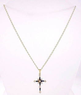 14k Yellow Gold Diamond Sapphire Cross Necklace: NS A00 14k yellow gold diamond sapphire cross necklace Measurements: Cross lenght is 1 1/8 inches, a widest part is 2/3 inches Total chain length is 8 inches Weight is 5.8 grams In excellent