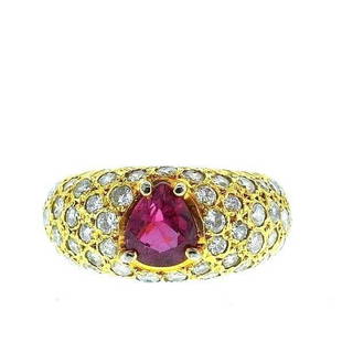 1980's 18K Yellow Gold Diamonds and Ruby Ring: KG T00 1980’s 18K Yellow Gold Diamonds and Ruby Ring · Weight: 5 g · Material: 18K Yellow Gold · Gemstone: Round brilliant cut diamonds 1.5 ct I-J/ SI1 · Gemstone2: Pear shape ruby 0.70 ct