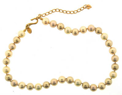 ELEGANT Carolee Faux Pearl Necklace: DK Carolee Faux Pearls This unique and wonderful necklace is made by Carolee. It is faux. The length is 15 ¾ inches. The height of each pearl is between ¼ and ½ of an inch. Reserve: $70.00 