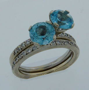 Cute & Delicate BLUE TOPAZ DIAMOND & WHITE GOLD DUO of: VK EOO Cute and Delicate Blue Topaz, Diamond & 14k White Gold Duo of Rings by Janis Savitt This lovely and delicate duo of rings was created by Janis Savitt. You can find her sensual designs in