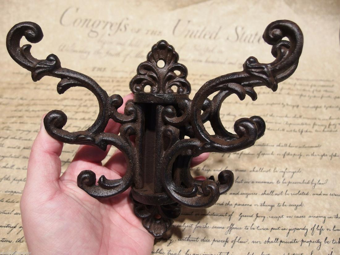 Wall Hook Swivel Folding Coat Rack Hanger Hardware 3: 1) Hook 6 1/2" Tall.. 8 1/2" Wide 5" Extension Great sturdy iron wall hook cast from an antique. 3 folding arms Great textured black/brown color powder coat... a very sturdy finish. Reserve: $15.00 Sh
