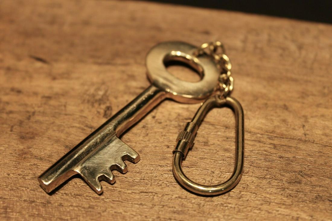 Brass Old Key Keychain: 2 7/8" Key 5 1/2" total length Great brass reproduction key keychain! The keychain and key are a nice gold shiny polished brass. Nice heavy solid quality. Reserve: $8.00 Shipping: Domestic: Flat-rate