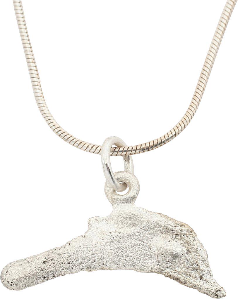 GREEK BRONZE DOLPHIN “COIN” PENDANT 5TH-4TH CENTURY BC.: From the Greek Black Sea colony of Olbia which provided slaves, cereal and fish. Before die struck coinage, these dolphin figures served as a means of exchange, vital for commerce to thrive. They are 