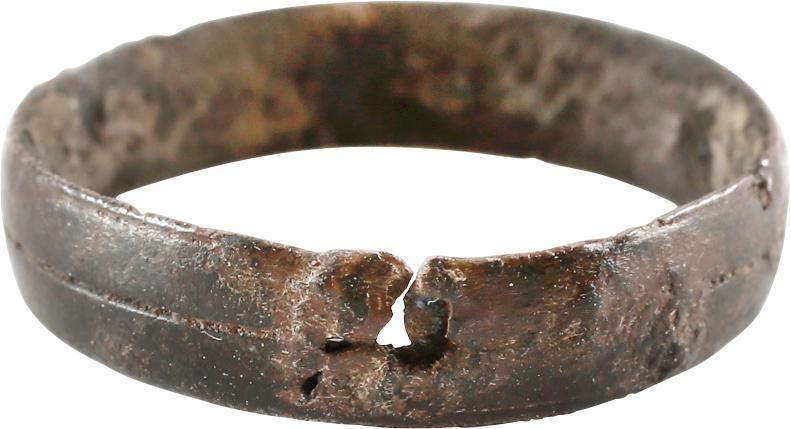 RARE COPPER VIKING RING, 900-1050 AD, S 9 1/2: No Reserve! Size 9 1/2. Broad width band, 4.9mm, with rounded face and a medial incised line. Mottled red/brown patina with encrustation from burial. Vikings were expert metallurgists. The use of pure