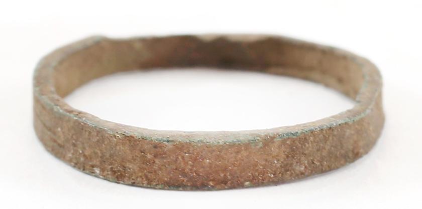 ANCIENT VIKING WEDDING RING C.850-1050 AD SZ 7: No Reserve! Bronze, Sz 7 Flat band tapering from 2.5mm to 2.9mm. Surface with light encrustation from burial. Vikings exchanged rings on the pommel of the groom’s sword. Gift boxed with certificate 