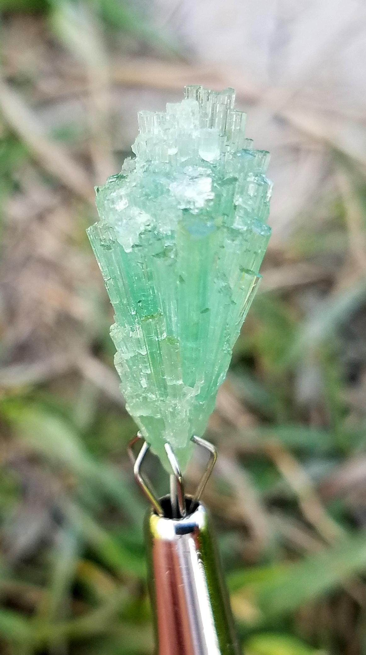 10 Carats Natural Blu Tourmaline Crystal: Title: 10 Carats Natural Blu Tourmaline Crystal Gemstones: Tourmaline Carat Weights: 10 Carats Size/Dimensions: 24x10x9 MM Additional Information: Natural Reserve: $40.00 Shipping: Domestic: Flat-rat