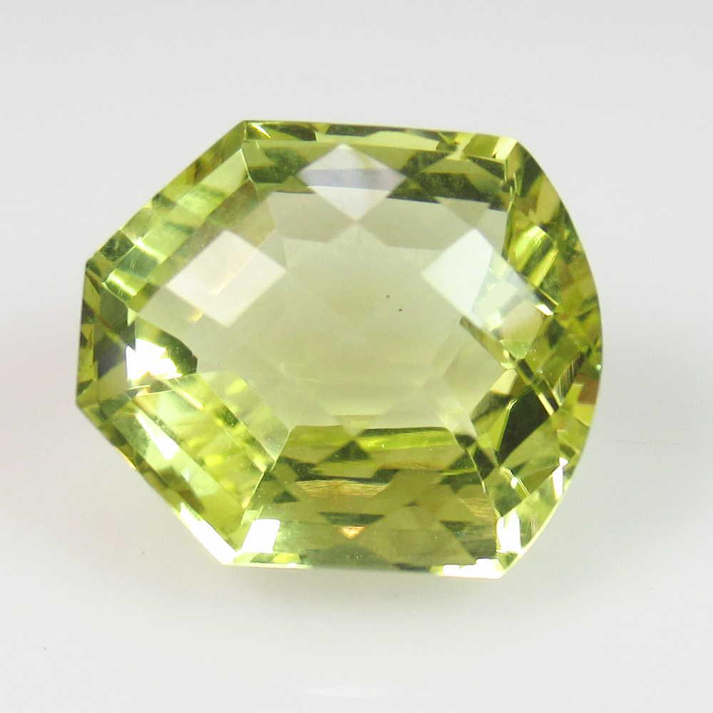 10.38 Ct Genuine Lemon Quartz Fancy Cut: No Reserve! Title: 10.38 Ct Genuine Lemon Quartz Fancy Cut Stone Clarity: VVS Gemstone: Natuarl Lemon Quartz Carat Weights: 10.38 Size/Dimensions: 14.50 x 12.40 x 9.20 mm Top Quality Luster / Excellen