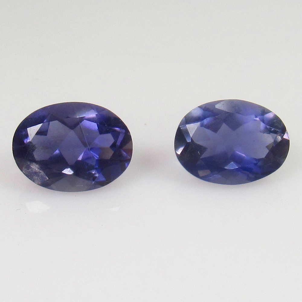 2.18 Ct Genuine Iolite Oval Pair: No Reserve! Title: 2.18 Ct Genuine Iolite Oval Pair Stone Clarity: VVS Gemstone: Natural Iolite Carat Weights: 2.18 Size/Dimensions: 8.00 x 6.00 x 4.00 mm Very Good Luster / Excellent Oval Matching Pa