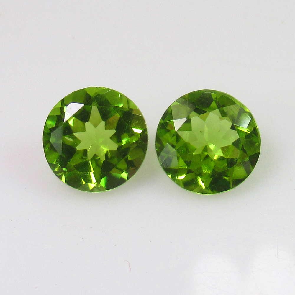 2.66 Ct Genuine Pakistan Peridot Round Pair: No Reserve! Title: 2.66 Ct Genuine Pakistan Peridot Round Pair Stone Clarity: VVS Gemstone: Natural Peridot Carat Weights: 2.66 Size/Dimensions: 7.00 x 7.00 x3.80 mm / 2 PC's Top Class Full Luster / E