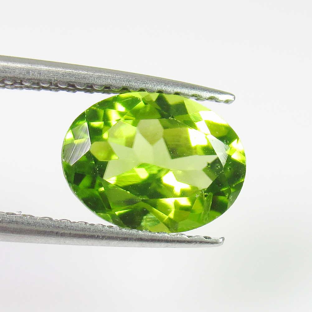 1.26 Ctw Natural Pakistan Peridot Oval Cut: No Reserve! Title: 1.26 Ctw Natural Pakistan Peridot Oval Cut Stone Clarity: VVS Gemstones: Peridot Carat Weights: 1.26 Size/Dimensions: 8.20 x 6.00 x 3.70 mm Additional Information: Top Class Luster 