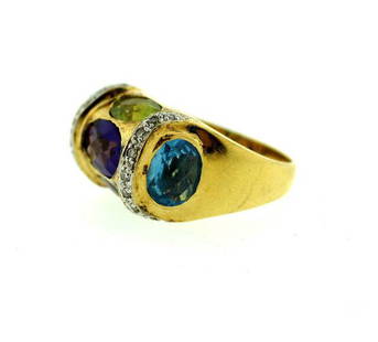 18K YELLOW GOLD AMETHYST PERIDOT CITRINE TOPAZ DIAMOND: N-GOO STYLISH 18K YELLOW GOLD AMETHYST GREEN PERIDOT GARNET CITRINE BLUE TOPAZ DIAMOND RING STAMPED Don’t miss out – we have ONLY ONE piece AVAILABLE! Make your offer. SIZE: 6.75 WIDTH 1/2''