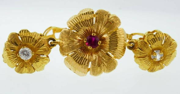 22k Yellow Gold Egyptian Floral Bangle: NS J000 Beautiful and Cute 22k Yellow Gold Egyptian Floral Bangle features White Sapphires and Glass Measurements: Length is 7.5 inches Weight is 28.4 grams In excellent condition; wear consistent wit