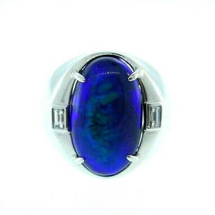 GORGEOUS Patinum, Baguette Diamond & Australian Black: Gorgeous Platinum, Baguette Diamond & Australian Black Opal Ring DK · This is a must for a collector. The weight is 24.5 grams. The height is 3/4 of an inch. The width of band is 1/4 of an inch.