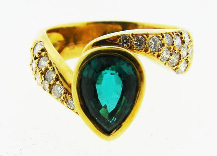 TIMELESS H. Stern 18k Yellow Gold, Gold & Green: DK H. Stern 18k Yellow Gold, Diamond & Green Tourmaline Ring Circa 1990s! This wonderful item is one of a kind! The weight is 6.9 grams. The height is ½ of an inch. The width is ¼ of an inch. 