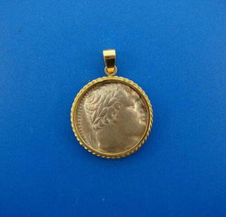 COOL 14k Yellow Gold & Roman Coin Pendant: DK 14k Yellow Gold & Roman Coin Pendant · This is a must for any collector. · The weight is 16.7 grams. · The height with bail is 1 ½ inches. The width is 3/16 of an inch. Reserve: $402.50