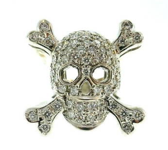 Roberto Coin Skull and Crossbones 18k White Gold: NS JE00 Roberto Coin Skull and Crossbones ring made of 18k white gold features diamond There is a tiny ruby on a back which is a part of the Roberto Coin maker's mark Stamped with the Roberto Coin