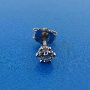 NICE 14k White Gold & Diamond Single Stud Earring: DK 14k White Gold & Diamond Single Stud Earring · Wonderful earring that is a necessity in your collection. · The weight is 0.3 grams. · The length of the diamond is 1/8 of an inch. There is