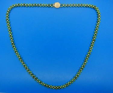 TIMELESS 14k Yellow Gold & Jade Bead Necklace Circa: DK 14k Yellow Gold & Jade Bead Necklace · This is a must for any collector. · The weight is 26.3 grams. · The length is 25 inches. The width is 5/16 of an inch. Reserve: $350.00 