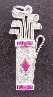 Platinum Diamond Ruby Charm: NS ET0 Platinum Golf Bag charm features ruby and diamond Measurements: Length is 7/8 inches, a widest part is 1/4 inches Weight is 2.3 grams In excellent condition; wear consistent with age and