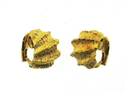 CHIC 18k Yellow Gold Clip On Earrings: 18k Yellow Gold Clip On Earrings · This is a must for any collector. · The weight is 23.6 grams. · The height is 7/8 of an inch. The width is 3/8 of an inch. Reserve: $840.00 