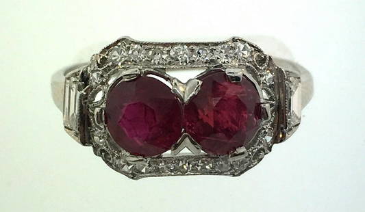 Stunning Rubies and Diamonds Platinum Ring wow!: SJ- NR00 PLATINUM RUBIES AND DIAMONDS RING · Gorgeous ring that would make a beautiful gift for yourself or someone you care for! · Weight is 4g · Made of platinum, and has two round rubies in