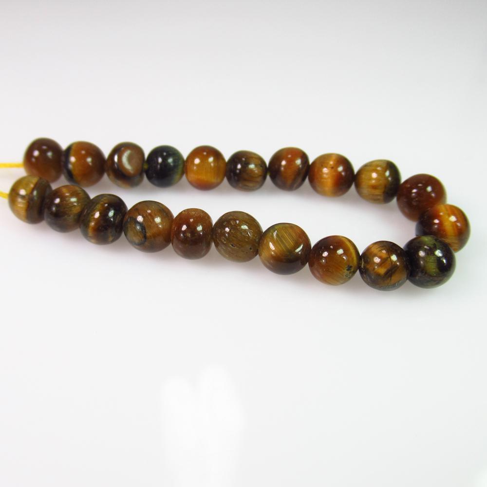 18.53 Ct Genuine 21 Drilled Tiger's eye Ball Beads (1 of 2)