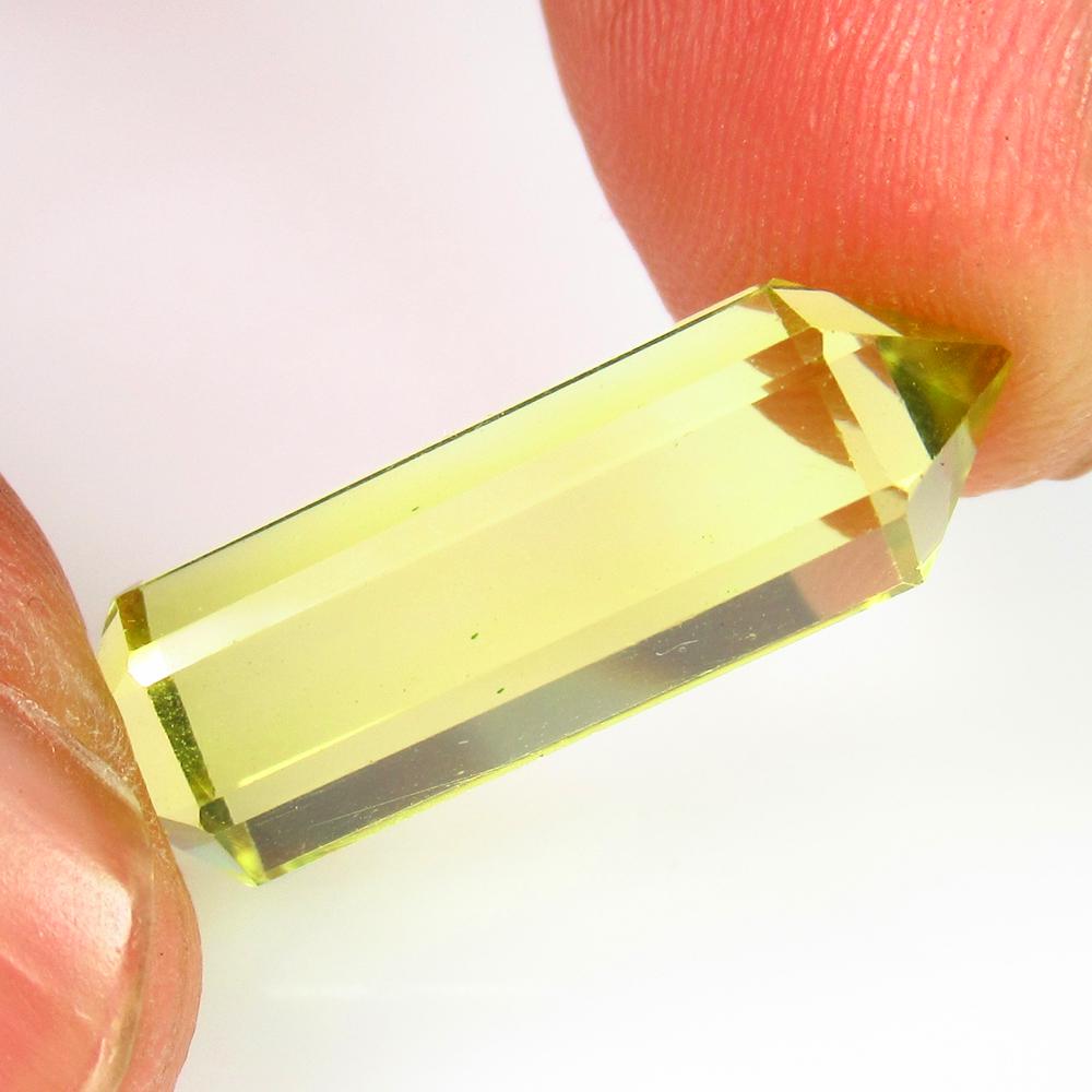 7.42 Ct Genuine Lemon Quartz Fancy Cut: No Reserve! Title: 7.42 Ct Genuine Lemon Quartz Fancy Cut Stone Clarity: VVS Gemstones: Natuarl Lemon Quartz Carat Weights: 7.42 Size/Dimensions: 20.00 x 6.90 x 6.90 mm Additional Information: Top Qua