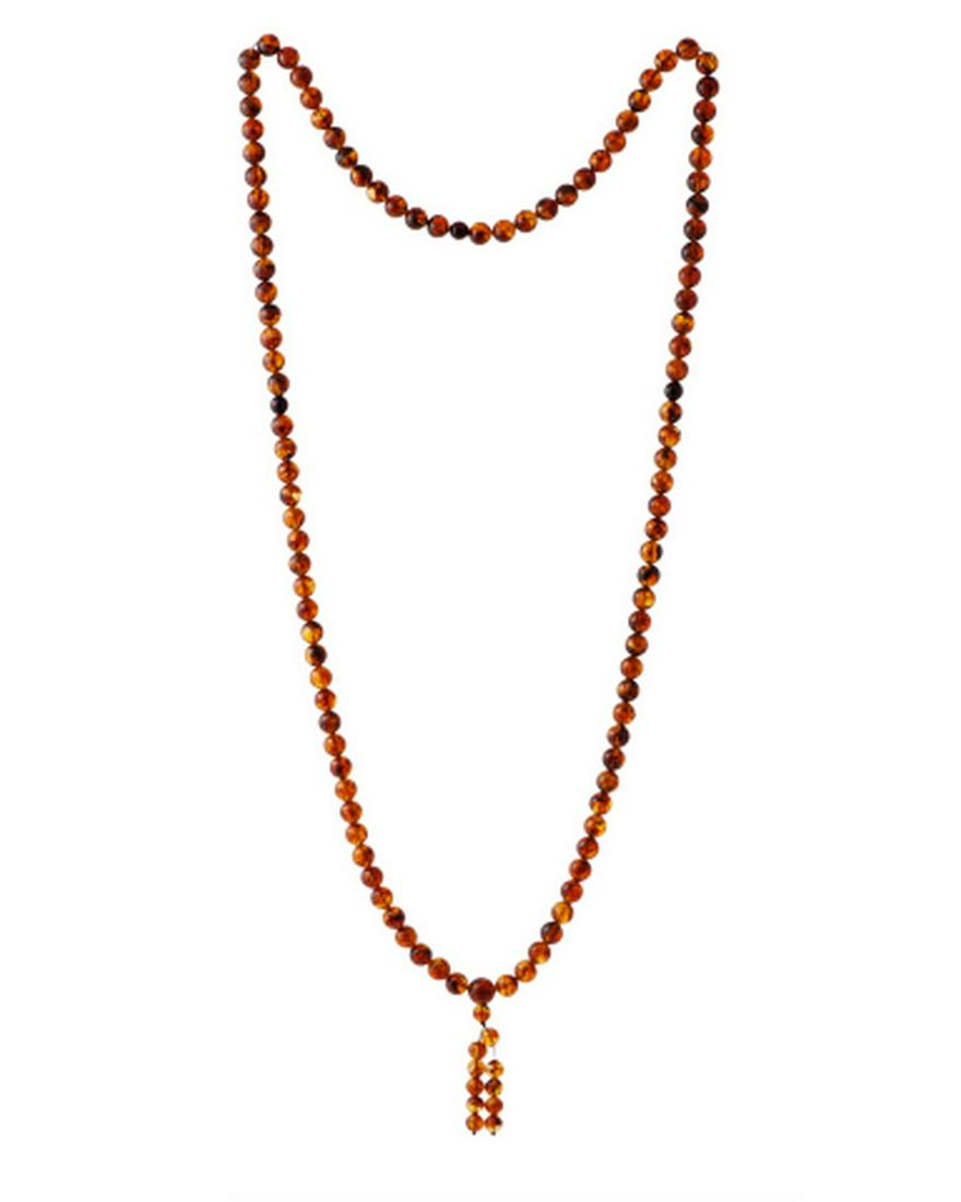 Caribbean Green Amber Rosary: No Reserve! Title: Caribbean Green Amber Rosary Materials: Caribbean Green Amber Weight in grams: 63.13 Caribbean Green Amber Rosary. Ball shaped. Dark cognac color. Buddhist10mm Diameter Beads Shippi