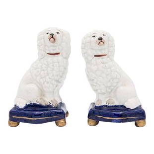 Antique English Staffordshire Poodles Figurines - a: A wonderful 19th-Century English Staffordshire pair of poodle dogs seated on blue cushions with gilt accents. These charming dogs are hand painted with fine details and the sweetest expressions. It's