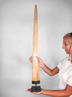 Fine Large Swordfish Tusks with custom stand: Title: Fine Large Swordfish Tusks with custom standMaker: UnknownOrigin: Papua New GuineaDate/Period: 2019Materials:Bone, SteelDimensions:Height: 94cm / 37 inchesDescritpion:Exceptional extra large