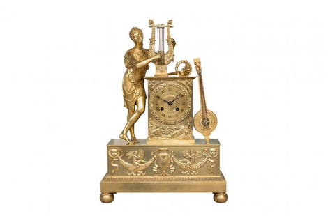 Antique empire gilded pendule: Title: Antique empire gilded penduleMaker: Antique empire gilded penduleOrigin: Paris, FranceDate/Period: 1860Materials:Bronze, gildedDimensions:Width (cm)30Depth (cm)12Height