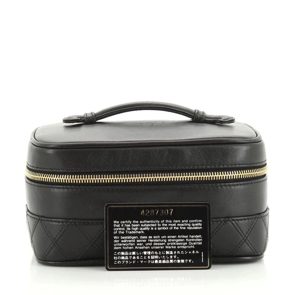 Chanel Cosmetic Case Black Lambskin Leather: Authentic Chanel Cosmetic Case in Black Lambskin Leather. This case is the perfect companion to store all your precious beauty items. This is an iconic bag that is ideal for all of your makeup and acc