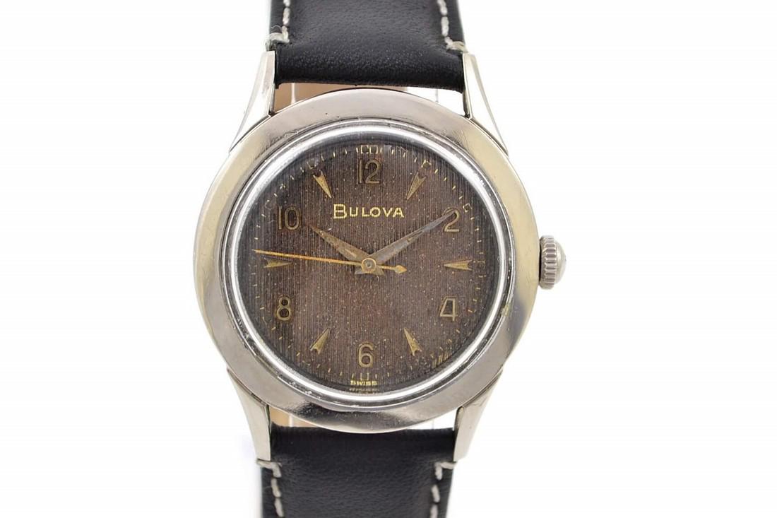 Vintage Bulova Arabic Dial Stainless Steel Hand Wind: Title: Vintage Bulova Arabic Dial Stainless Steel Hand Wind Midsize Watch Brand: Bulova Date: 1970s Model: Classic Movement: Manual Wind Functions: Time Case Metal: Stainless steel Case Size: 34mm X 4