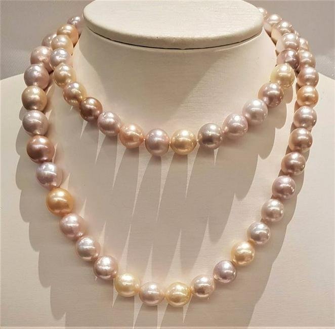 925 Silver - 11x14mm Multi Edison Pearls - Necklace: Most freshwater pearls are nucleated by tissue, but Edison cultured pearls are nucleated with beads, exactly as saltwater pearls This luxurious necklace contains 67 Edison Pearls which were chosen for