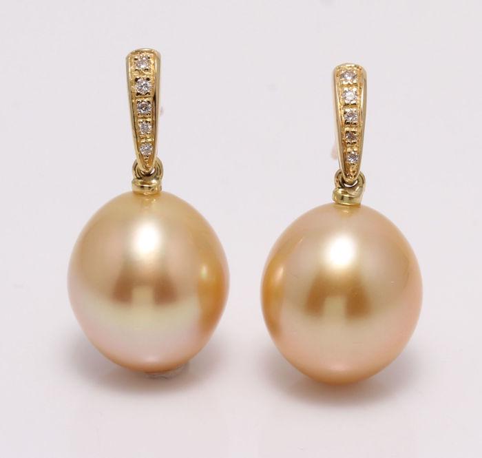 14 kt. Yellow Gold - 10x11mm Golden South Sea Pearls -: Produced by the gold-lipped Pinctada Maxima Oyster in the warm waters of Indonesia, these pearls have a natural magnificent deep golden honey color and look beautiful with the yellow gold and diamonds