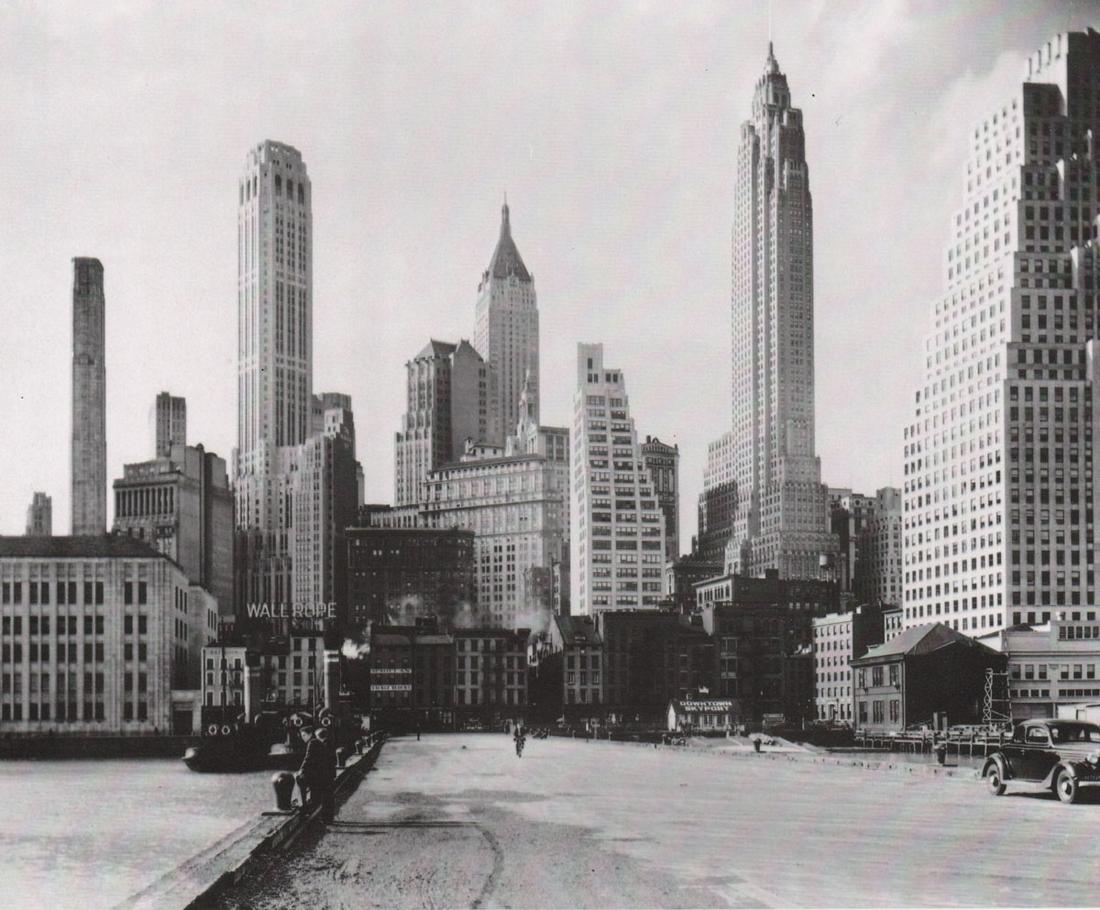 BERENICE ABBOTT- Manhattan from Pier 11: Artist: BERENICE ABBOT Print Title: Manhattan from Pier 11 Medium: Photo-lithograph Printed in: Japan, 1980’s Image Size: approx. 8 x 9.5” Berenice Abbott (1898 – 1991),was an American photograp