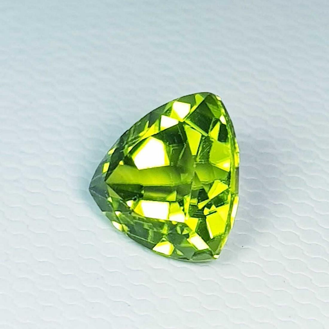 2.45 ct Natural Peridot Triangle Cut: No Reserve! Title: 2.45 ct Natural Peridot Triangle Cut Color/Clarity: VVS Gemstones: Loosegemstone Carat Weights: $2 Size/Dimensions: 8.10 x 8.10 x 5.70 Additional Information: Triangle - Pakistan Sh